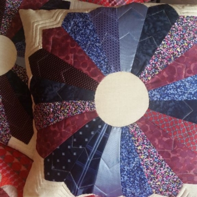 Dresden patchwork quilt cushions stitched with ties and fabric chosen by Susan