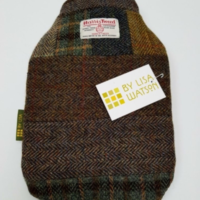 Keep warm and cosy during wintry weather with a one of a kind 100% British made Harris Tweed Patchwork Hot Water Bottle cover.