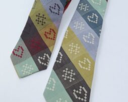 Choose from Ecru or Multi Heart&Kiss woven Folklore Fabric Tie.