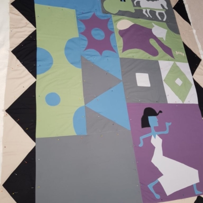 Pinning quilt layers together