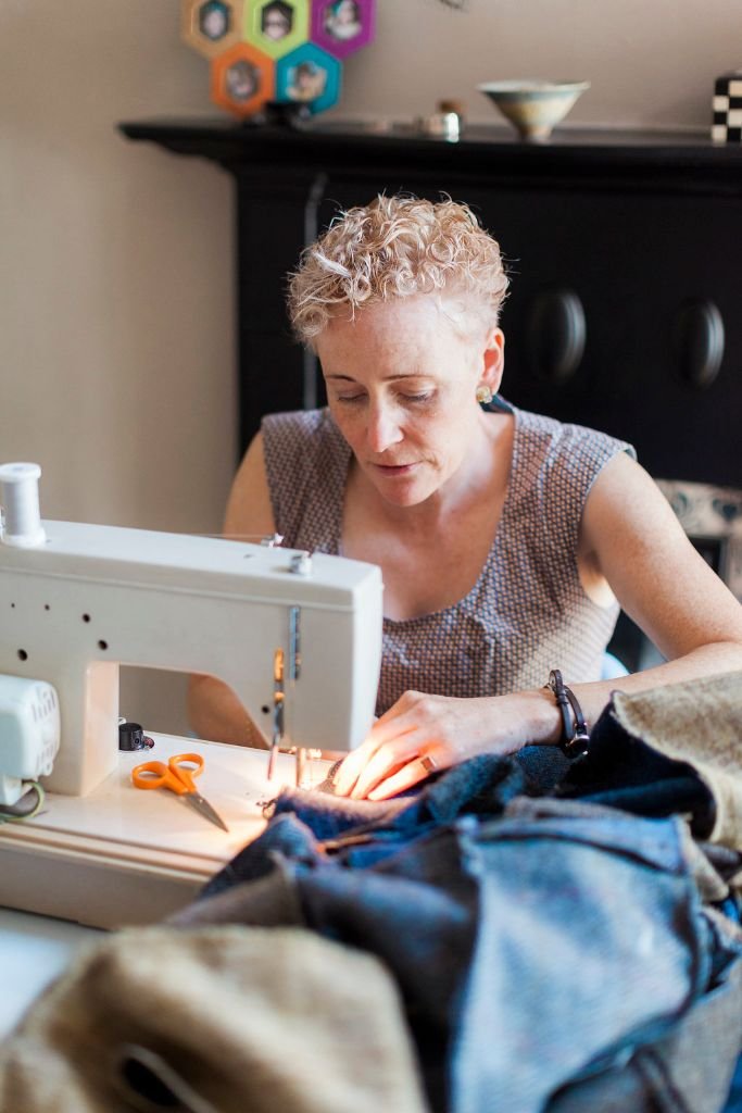 Lisa sewing a bespoke Harris Tweed patchwork quilt