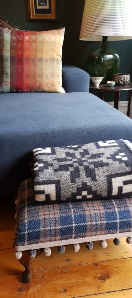Carbon Blue and Ash silver are the contemporary colourways for this wool throw, so you can flip this reversible blanket to suit your interiors and/or your colour mood.